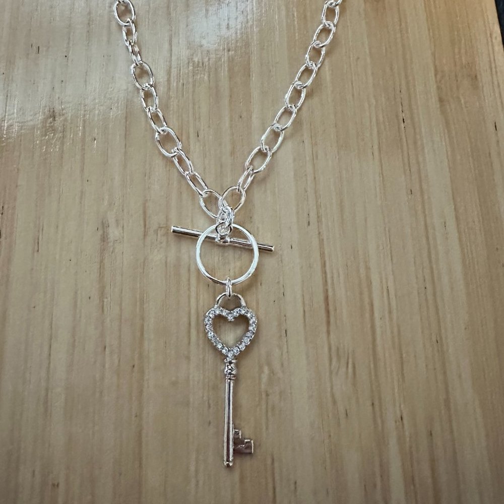 Silver 16" toggle chain with silver crystal heart key charm